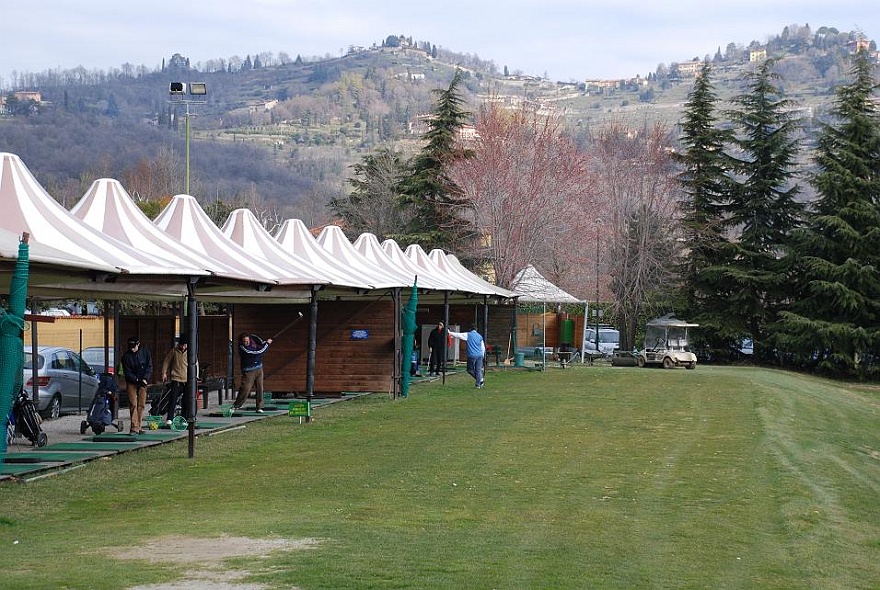 DSC_0093.JPG - driving range with wonderfull hills in the back.